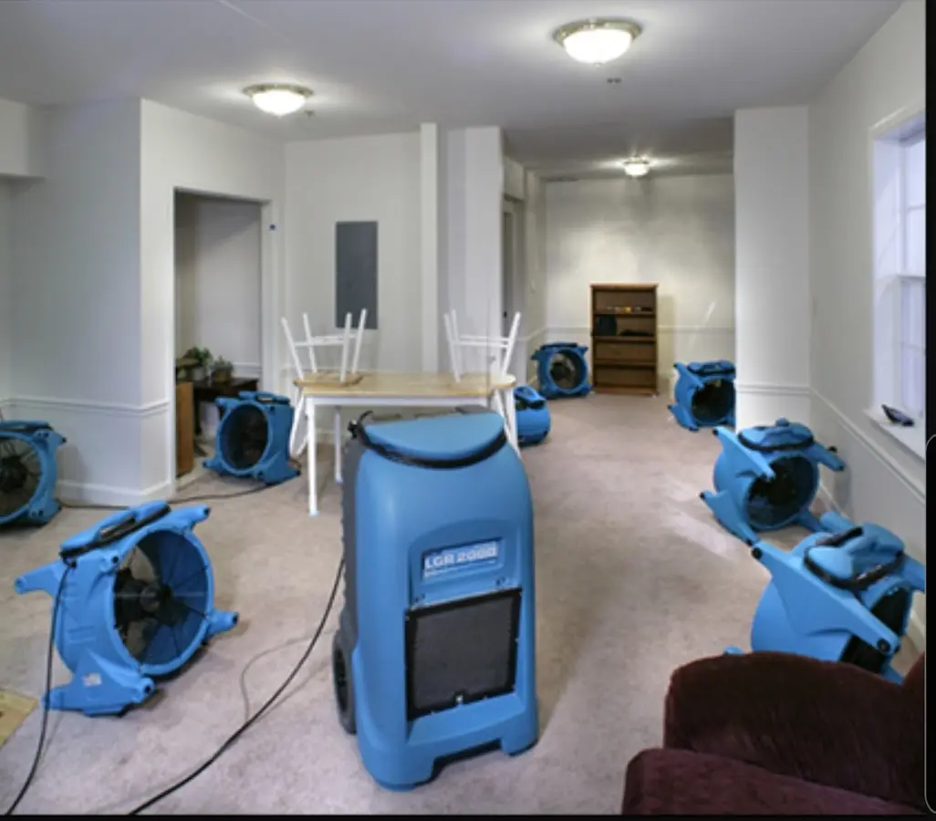 Air movers and dehumidifier setup for Water Damage Restoration in Englewood